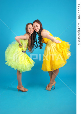 Two young girls in ballroom dress 86143634