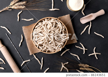 Fresh maccheroni typical dish of Puglia Salento Italy. Italian homemade pasta background, top view 86143651