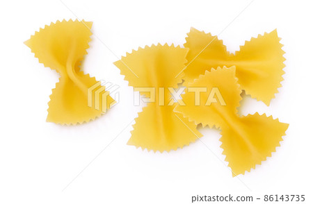 Bow tie pasta isolated on white background with clipping path and full depth of field. Top view. Flat lay. 86143735