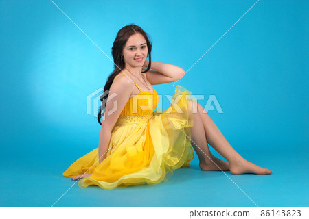 Young girl in ballroom dress 86143823