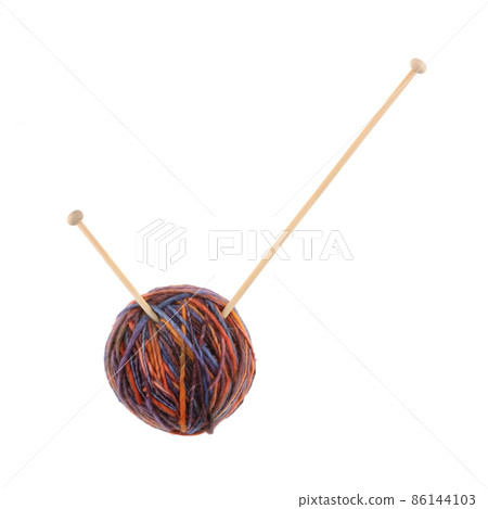 Tick checkmark made from a ball of wool and knitting needles Tick checkmark made from a ball of wool and knitting needles 86144103