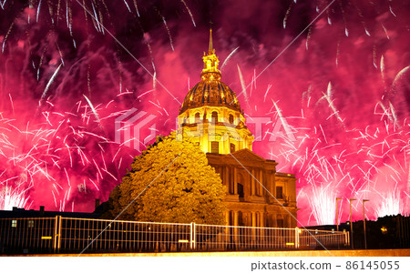 Celebratory colorful fireworks over the Les Invalides (The National Residence of the Invalids) at night. Paris, France Celebratory colorful fireworks over the Les Invalides (The National Residence of the Invalids) at night. Paris, France 86145055
