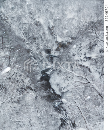 Naruko Gorge in a snowstorm, Osaki City, Miyagi Prefecture 86146704