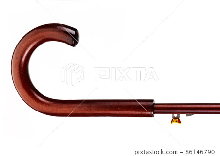 Dark wooden umbrella handle on white background 86146790