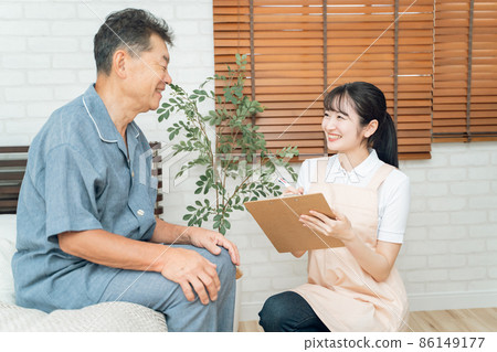 Female staff counseling elderly men Female staff counseling elderly men 86149177