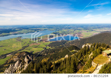 Green fields next to Neuschwanstein Green fields next to Neuschwanstein 86151204