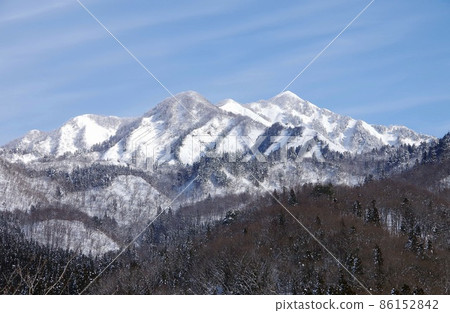 Winter mountain view around the Akaya district of Shibata city 86152842