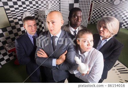 Businesspeople together near computer in quest room-lab Businesspeople together near computer in quest room-lab 86154016