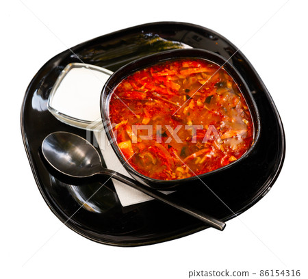 National dish of Russian cuisine is Solyanka soup 86154316