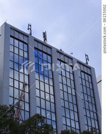 Cranes that are active at construction sites of building construction Cranes that are active at construction sites of building construction 86155002
