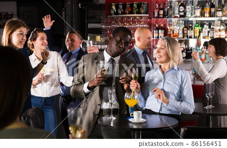 Afro man and Caucasian woman having conversation Afro man and Caucasian woman having conversation 86156451