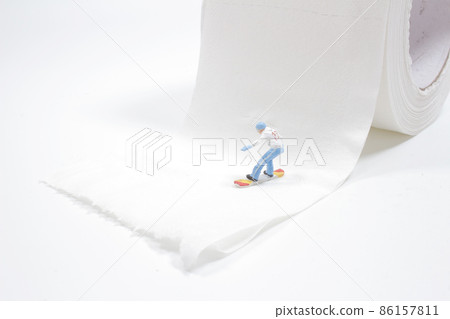 a mini snowboarding sportsman in snow action and motion a mini snowboarding sportsman in snow action and motion 86157811