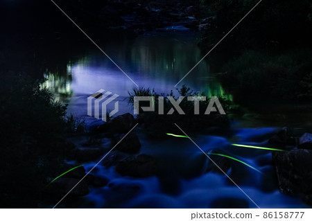It is a quiet night of the Takiyama River Gorge and the scenery of fireflies. You can feel the silence. Hiroshima It is a quiet night of the Takiyama River Gorge and the scenery of fireflies. You can feel the silence. Hiroshima 86158777