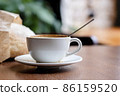 Cup of coffee latte on in a cafe on a wooden table 86159520