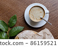 Cup of coffee latte on in a cafe on a wooden table 86159521