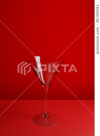Empty Luxury Cocktail Glass on Red Beautiful Background. Rendering from 3D. Empty Luxury Cocktail Glass on Red Beautiful Background. Rendering from 3D. 86160491