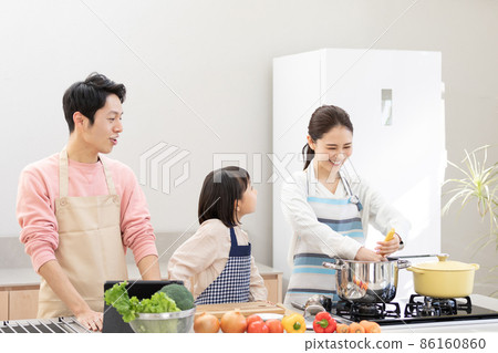 Home time: Family enjoying cooking 86160860