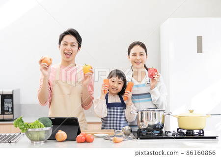 Home time: Family enjoying cooking 86160866