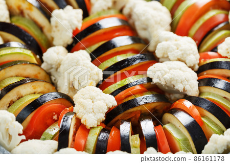 Fresh chopped vegetables for ratatouille dish close-up 86161178