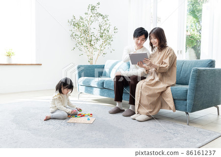 Family enjoying nesting and home time Family enjoying nesting and home time 86161237
