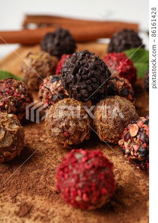 Concept of sweets with chocolate candies, close up 86161428