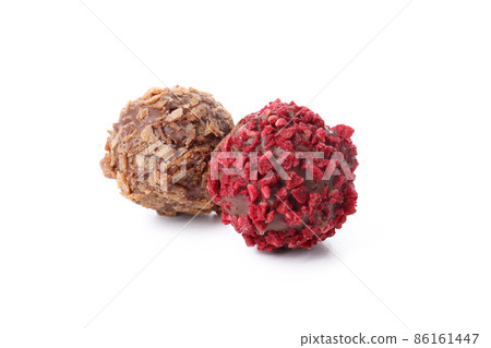 Sweet truffles isolated on white background, close up Sweet truffles isolated on white background, close up 86161447