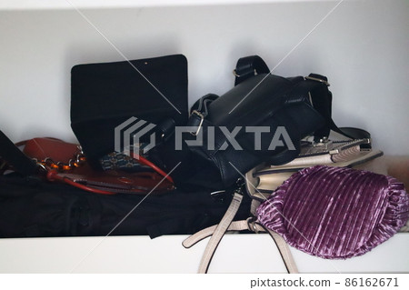 A messy closet bag 86162671
