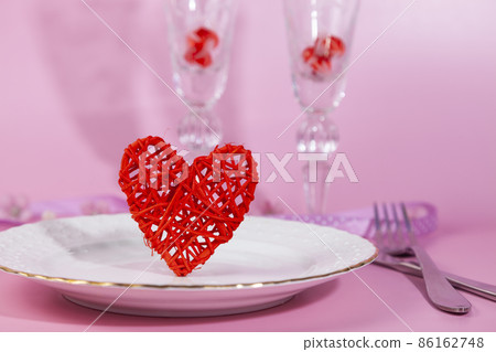 Valentine's day romantic dinner with red hearts on pink background. Valentine's day romantic dinner with red hearts on pink background. 86162748