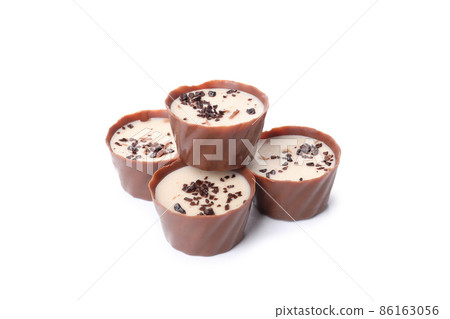 Milk chocolate candies isolated on white background 86163056