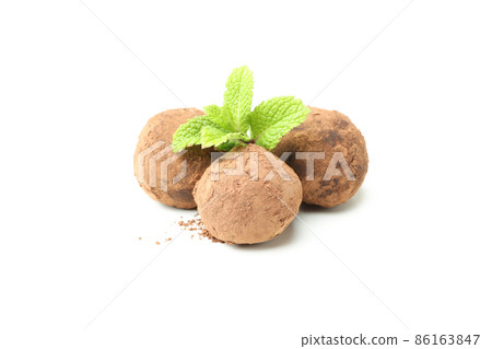 Concept of sweets with truffles isolated on white background Concept of sweets with truffles isolated on white background 86163847