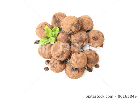 Concept of sweets with truffles isolated on white background Concept of sweets with truffles isolated on white background 86163849