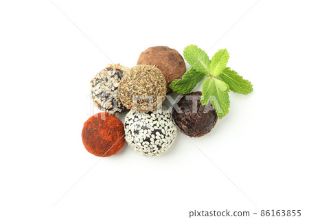 Concept of sweets with truffles isolated on white background Concept of sweets with truffles isolated on white background 86163855