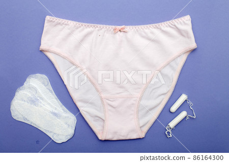 women's briefs with tampons and panty liners . hygiene and women's health care concept women's briefs with tampons and panty liners . hygiene and women's health care concept 86164300