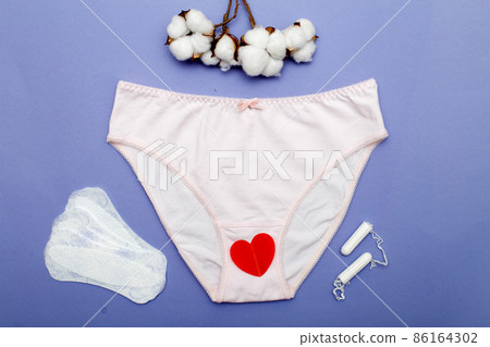 women's briefs with cotton, tampons and panty liners . hygiene and women's health care concept women's briefs with cotton, tampons and panty liners . hygiene and women's health care concept 86164302