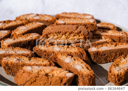 Homemade fresh Italian cookies cantuccini stacks and organic almond seeds. Biscotti Cantuccini Cookie Biscuits with Almonds Shortbread. Healthy eating food. Vegan dieting vegetarian 86164647