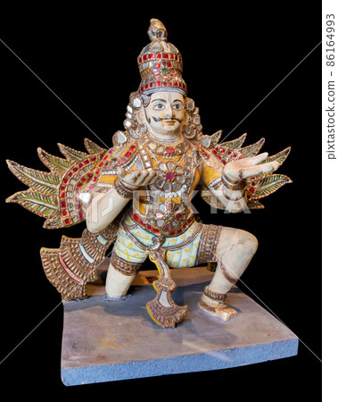 Garuda ancient statue isolated on black background with clipping path. Legendary bird or bird-like creature in Hindu, Buddhist and Jain faith 86164993