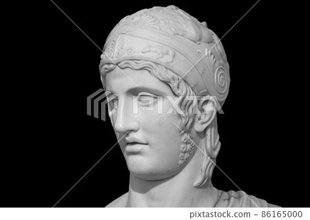 A statue of the ancient Greek god of war. Ares is the son of Zeus and Hera. One of the twelve gods of Olympus isolated on black background 86165000
