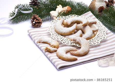Traditional German or Austrian Vanillekipferl vanilla kipferl cookies and Chistmas decorations 86165251