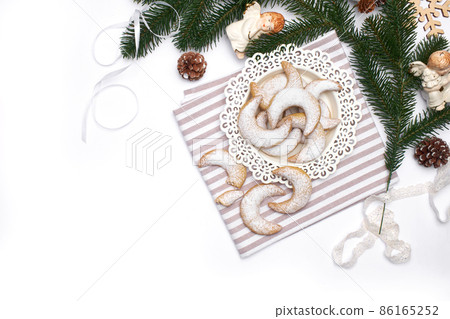 Traditional German or Austrian Vanillekipferl vanilla kipferl cookies and Chistmas decorations Traditional German or Austrian Vanillekipferl vanilla kipferl cookies and Chistmas decorations 86165252