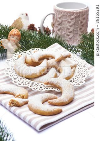Traditional German or Austrian Vanillekipferl vanilla kipferl cookies and Chistmas decorations Traditional German or Austrian Vanillekipferl vanilla kipferl cookies and Chistmas decorations 86165291