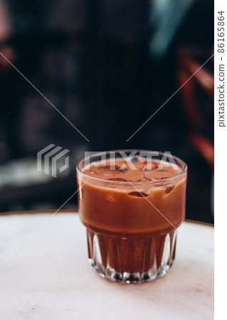 Chocolate cocktail with ice. Cooling drinks, desserts in the summer heat. Order in cafe 86165864