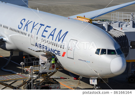 Air France aircraft loading cargo at Narita Airport Terminal 86166164
