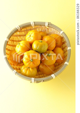 Ripe sudachi in a colander Ripe sudachi in a colander 86166329