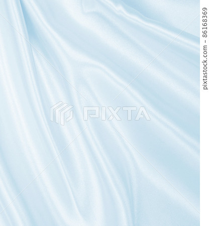 Smooth elegant blue silk or satin luxury cloth texture as abstract background. Luxurious background design Smooth elegant blue silk or satin luxury cloth texture as abstract background. Luxurious background design 86168369