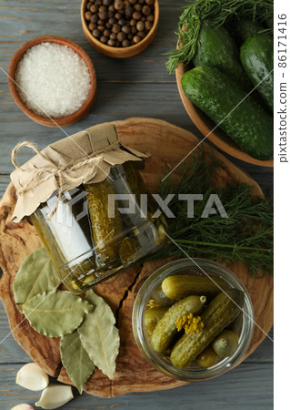 Concept of cooking pickles on gray wooden table 86171416