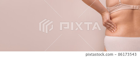 fat woman, fat side, plump, obese woman holding excessive fat on body sides, woman diet lifestyle concept fat woman, fat side, plump, obese woman holding excessive fat on body sides, woman diet lifestyle concept 86173543