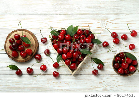 Concept of sweet berry with red cherry Concept of sweet berry with red cherry 86174533