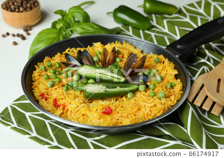 Concept of delicious food with Spanish Paella Concept of delicious food with Spanish Paella 86174917