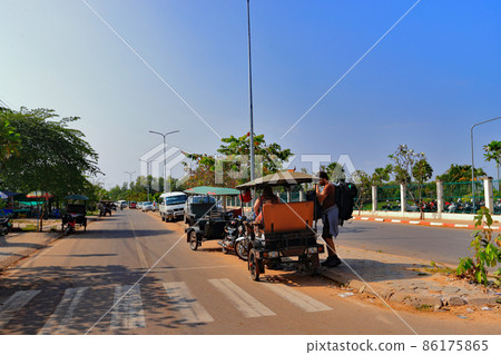 Three-wheeled vehicle around Siem Reap Airport in Cambodia Three-wheeled vehicle around Siem Reap Airport in Cambodia 86175865