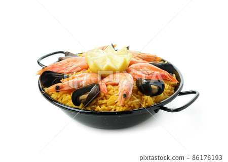 Delicious Spanish Paella isolated on white background Delicious Spanish Paella isolated on white background 86176193